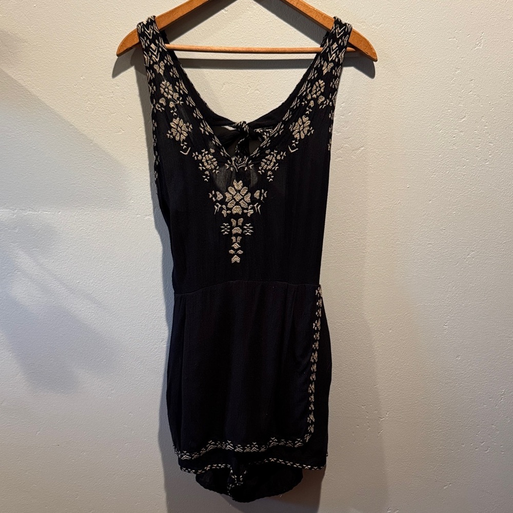 Free People Black Embroidered Lined Sleeveless Romper with pockets and open back